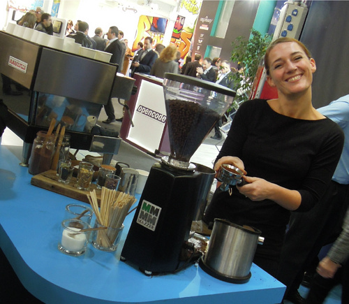 Top barista and all round fab person Daisy Rollo preps another cup of magic at the Spirent stand on the MWC show floor.