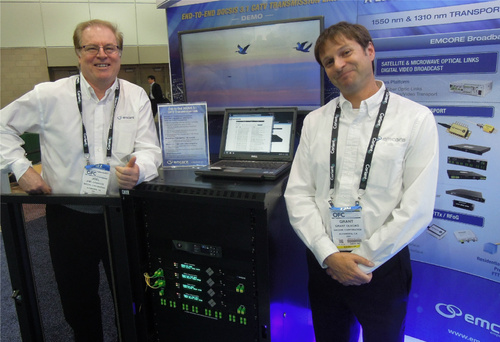 Emcore's corporate marketing communications manager Joel Counter and product marketing director Grant Olecko keep close guard of their DOCSIS 3.1 demo.