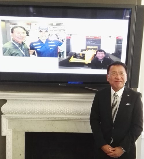 NTT Communications CEO Tetsuya Shoji in London. He loves Formula 1 racing, so we took his picture in front of the presentation slide that shows him with a F1 car. Love it!!