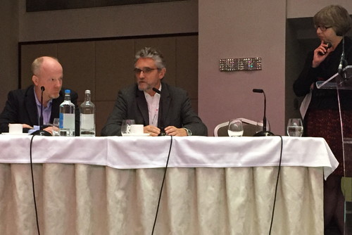 Klaus Martiny (center) touts the value of CIMs, while Stefan Wallin (left) looks on, waiting to pounce. Heavy Reading's Caroline Chappell (right) was clearly poised to break up any fisticuffs.