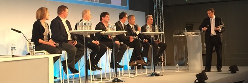 Executives from the first of two service-provider debates at MPLS/SDN/NFV World Congress, including (from left to right) AT&T's Maria Napierala, Verizon's Chris Emmons, Colt's Mirko Voltolini, Deutsche Telekom's Axel Clauberg, Orange's Francois Bertret, NTT's Kohei Shiomoto and Telecom Italia's Paolo Fasano.