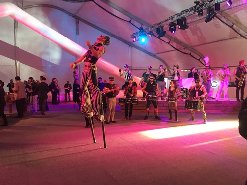 Spotify, a Google cloud customer, provided the music and stilt-walking dancer-acrobats. Click here for a panoramic photo of the entertainment.
By the way, how'd we get that panorama? Google Photos does that automatically, stitching together a series of still images that it identifies as part of a set. I've been using Google Photos for years. And Google announced Wednesday that it's making the AI engine in Google Photos available to the public, along with other Deep Learning tools. (See Google: 'Dead Serious' About Enterprise Cloud.)