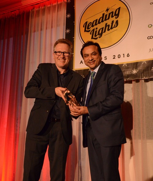 Rupesh Chokshi (right), AT&T's director of product marketing, network on demand, collects the Most Innovative SMB Service award from Light Reading's Ray Le Maistre. AT&T's winning entry was for its Managed Internet Service on Demand service.