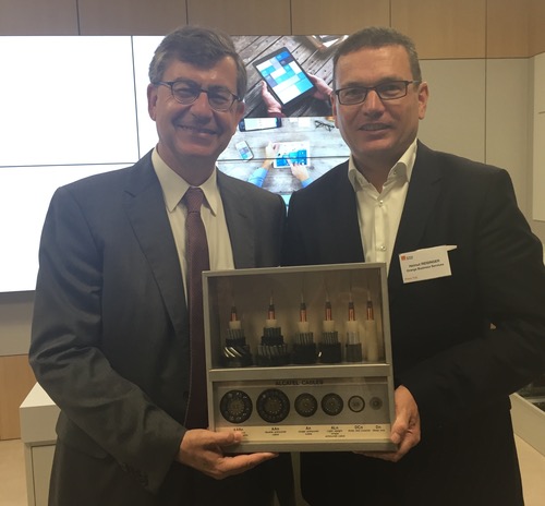 Pierre-Louis Biaggi, the vice president of sales development and partnerships for Orange Business Services, and Helmut Reisinger, the operator's executive vice president of international business, show off some undersea cables at the operator's facilities in Paris.