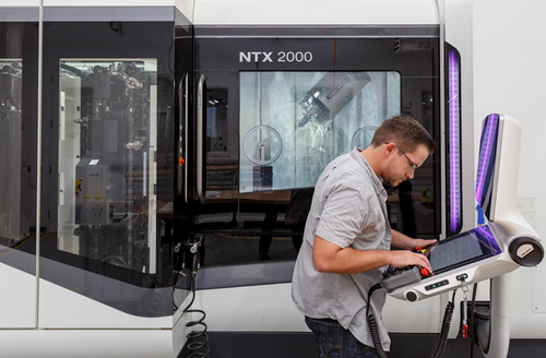The Area 404 lab includes this lathe for making complex parts that would otherwise need several pieces of equipment.