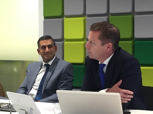 Deepak Harie (left), Nokia's vice president of systems integration for global services, smiles approvingly as Igor Leprince (right), the executive vice president of global services, outlines his new enterprise vision.