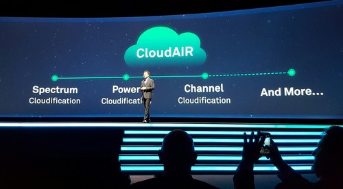 Edward Deng, President of Huawei's Wireless Solution division, presents CloudAIR at the MBB Forum near Tokyo.
