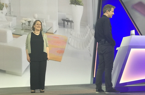 Google Cloud boss Diane Greene looks on while eBay Chief Product Officer R.J. Pittman demonstrates an eBay shopping assistant using Google Home.