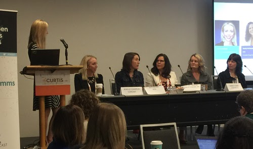 From left: WiC's Sarah Thomas chats with Comcast's Jenelle Champlin, Intel's Jeni Panhorst, Corporate Cowgirl Up's Wendy Hall Bohling, Vodafone America's Kimberly Eubank and Atlantic Broadband's Kristell Janusz.