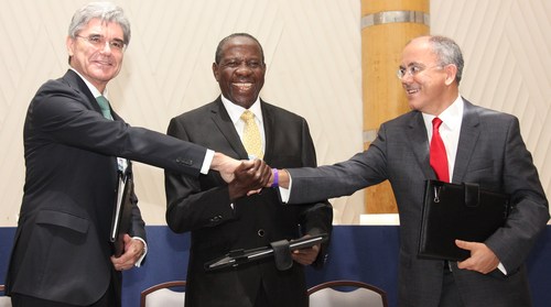 The signing of Uganda MOU (left to right): Joe Kaeser, Siemens Global President and CEO; Hon. Minister of Finance Matia Kasaija, Uganda; Mesut Sahin, CEO MMEC Mannesman, Germany.