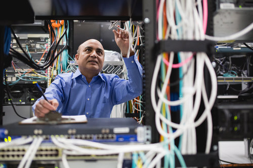 Chandra Upadhyay, Navisite senior director, systems engineering, performs routine testing at Navisite's Andover, Mass., data center.