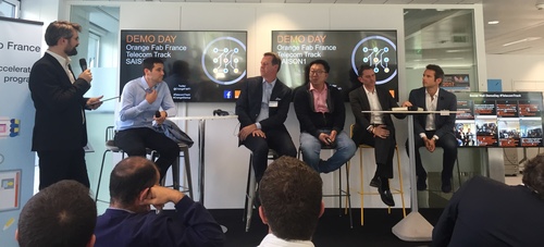 Executives from Orange, Facebook and Iris Capital address an audience of startups and investors in Paris this week. Seated from left to right: Etienne Moreau, investment manager at Orange Digital Ventures; Steve Jarrett, Facebook's head of infrastructure partnerships for Europe and the Middle East; Min Sun, infrastructure executive at Facebook; Luc Bretones, executive vice president of Orange's Technocentre; and Julien-David Nitlech, partner at Iris Capital.
