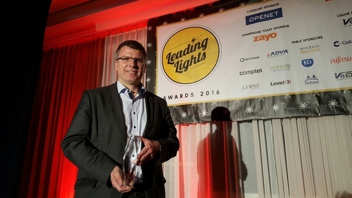 Sven Hischke, managing director of Deutsche Telekom's pan-net project, receives an award at Light Reading's Leading Lights awards in 2016.