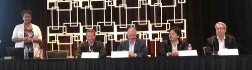 Heavy Reading's Roz Roseboro; Linux Foundation's Chris Aniszczyk. MetTel's Edward Fox III, NTT Innovation Institute's Icihiro Fukuda and SevOne's Steve Plotkin. 