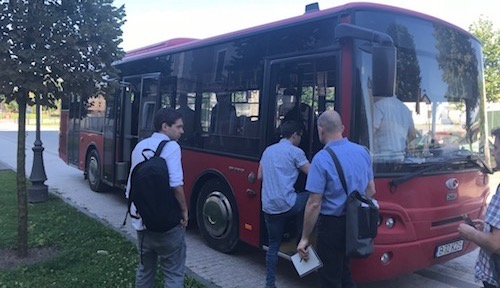 Reporters board one of the 15 buses in Alba Iulia that now feature air-quality monitors and WiFi technology.