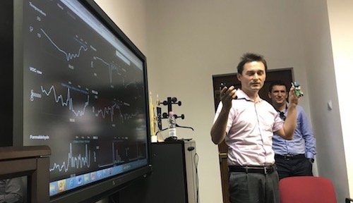 Radu Motisan, the founder of uRADMonitor, shows off his company's air-monitoring software in Alba Iulia.