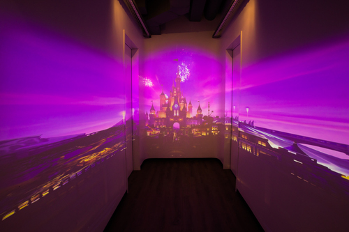 Take an ugly hallway and use projectors to wrap it in stunning imagery and add interactivity to produce something quite a bit different than the usual banner or movie poster. Photo courtesy of The Walt Disney Studios.