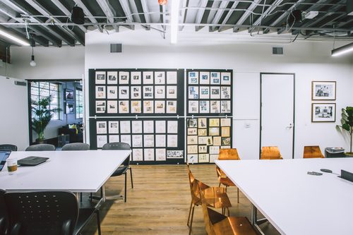 Another view of the StudioLAB collaboration room contrasts the classic way of sharing drawings, characters and ideas with the latest in cloud-ready collaboration tech. Photo courtesy of The Walt Disney Studios