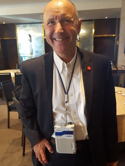 ADVA's Stephan Rettenberger sported the FSP 150-GO102Pro device as 'backhaul bling' at Light Reading's 2020 Vision Executive Summit in Lisbon (until it took a toll on his neck -- it's small but...)
