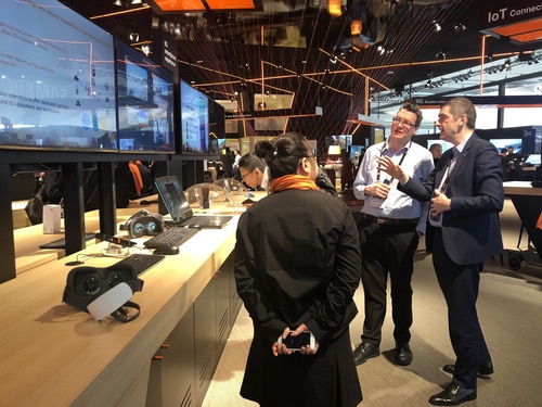 Orange's Arnaud Vamparys (at right of picture) talks to Light Reading at the French operator's MWC stand.