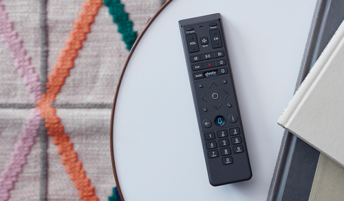 Comcast is working with new UK-based corporate cousin Sky to integrate X1's voice navigation and search capabilities into Sky's video platform, a clear indication that it's technically possible to deploy that voice technology without the full X1 platform. Pictured is the recently redesigned X1 voice remote, the XR15.