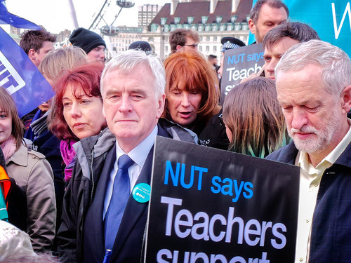 John McDonnell (left), the Labour Party's shadow chancellor, stands next to Jeremy Corbyn, its leader, at a demonstration.