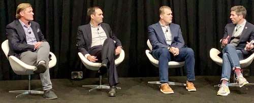 Boingo Wireless's Derek Peterson (left); Ericsson's Manuel Ruiz, Verizon's Justin Blair and GSMA's Peter Jarich and his socks.