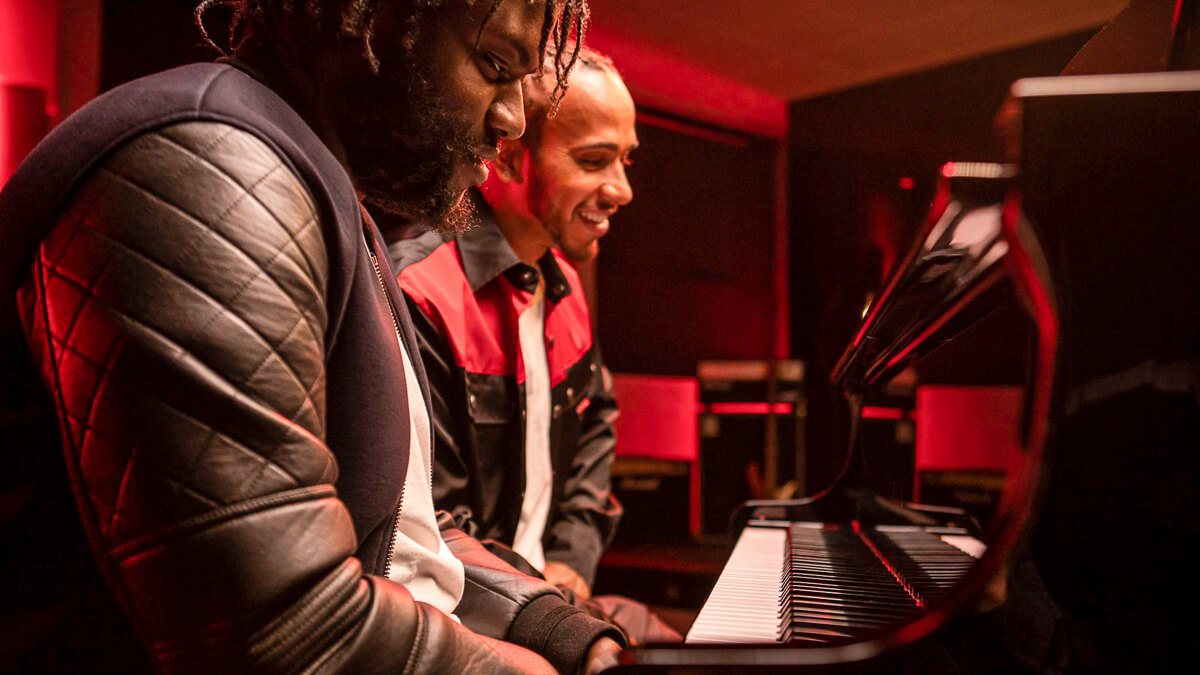 Notes on 5G: Lewis Hamilton playing a 5G piano is probably not going to send consumers running to commit to the platform. (Source: Vodafone UK)