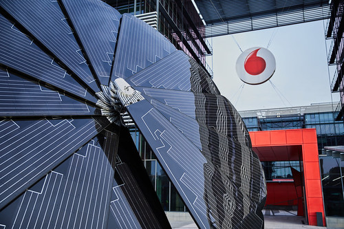 Flower power: Vodafone Plaza in Madrid is home to the 'Smartflower' solar panel, which imitates a sunflower's movement by automatically opening and closing at sunrise and sunset.   (Source: Vodafone)