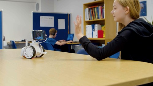 Rasmus Dalsten communes with a classmate via his 5G-controlled robot.