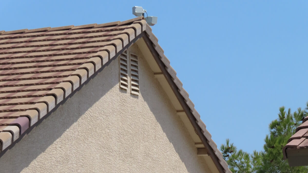 A WeLink radio device sits atop a residential home as part of the company's recent network deployments.  (Photo courtesy of WeLink.)
