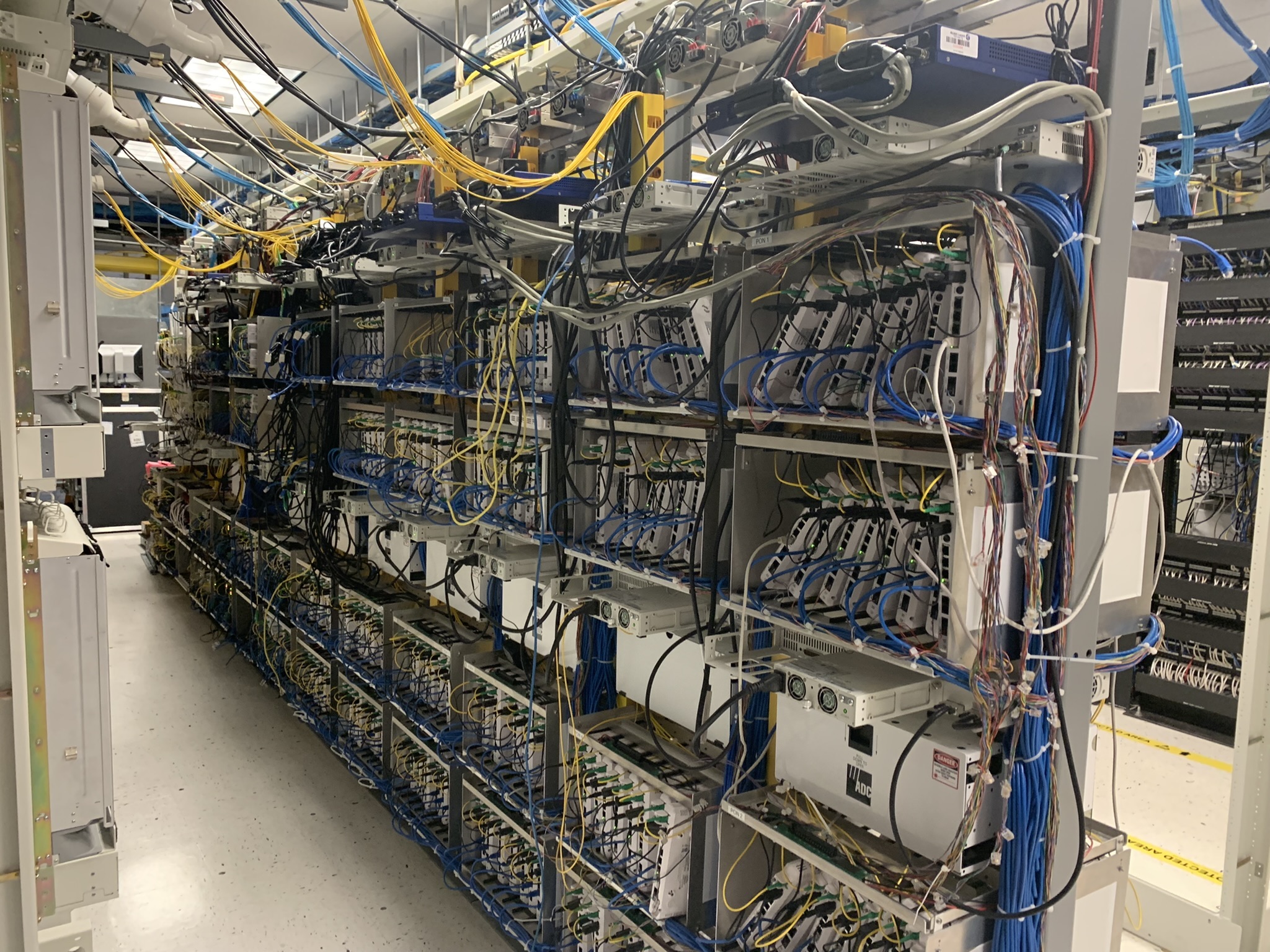 Racks on racks on racks. Several rows in the lab are empty now that Nokia and its customers have implemented virtualization and disaggregated hardware. In addition to the benefit of storing less hardware in the lab, Nokia's engineers were able to continue accessing and running tests on equipment remotely during the pandemic, says Eckard. Photo by: Kelsey Ziser. Click here for a larger version of this image.