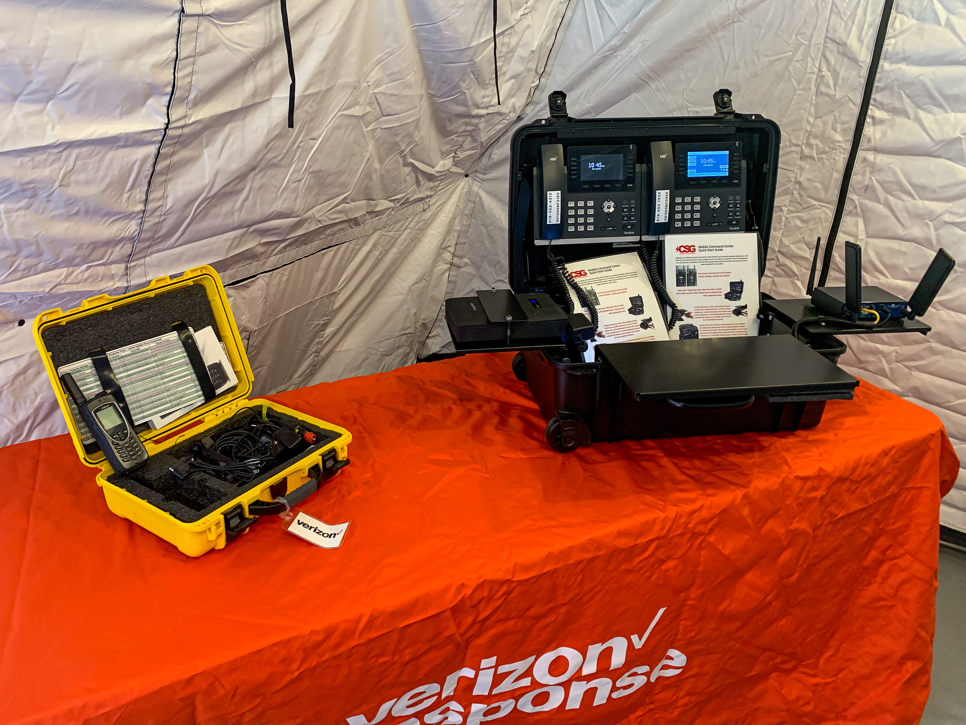 Inside one of Verizon's tents were connectivity equipment such as satellite phones and radio units. (Photo by: Kelsey Ziser, Light Reading.)
