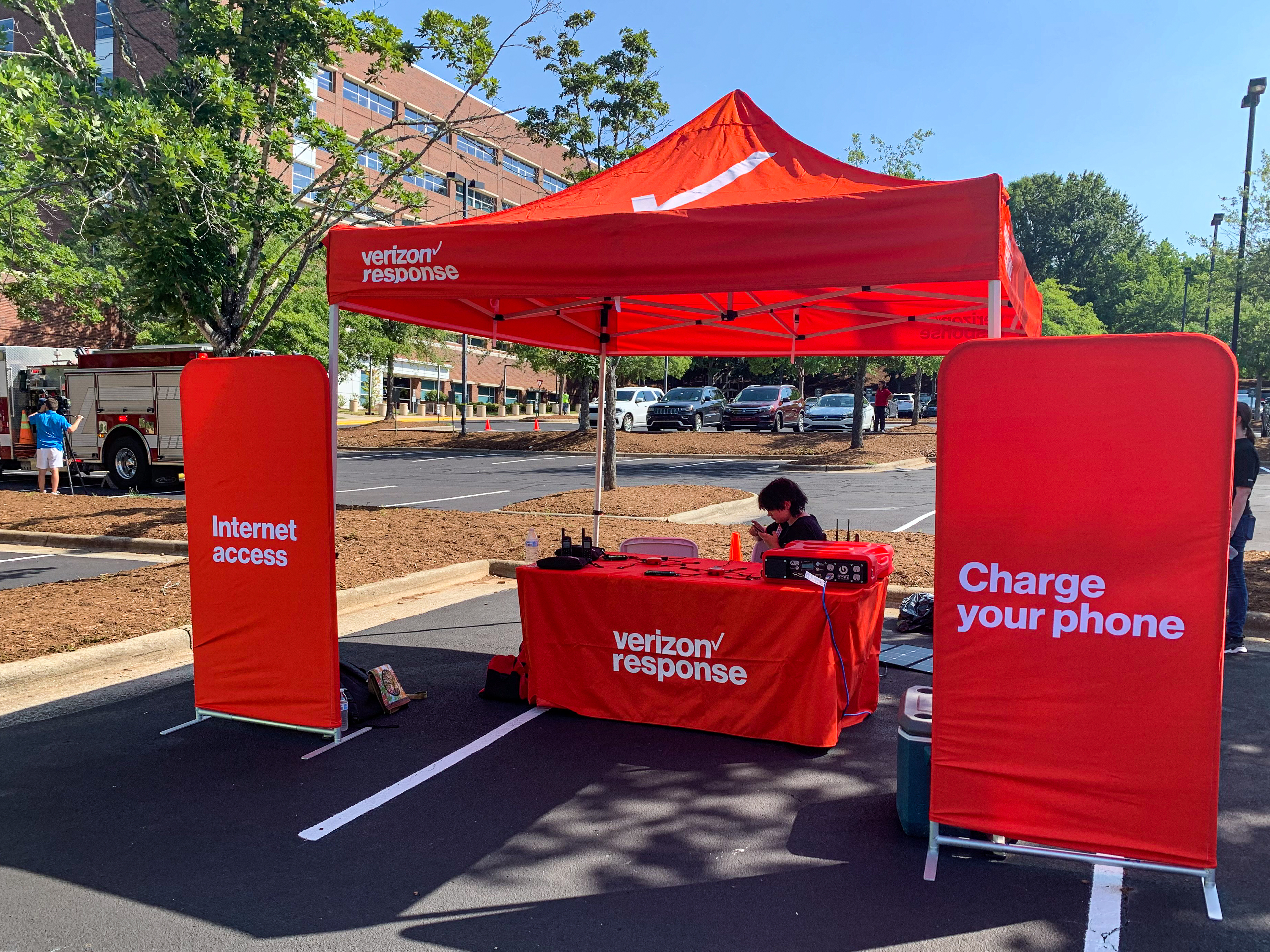 Verizon set up an Internet Access tent, which included several Wi-Fi connectivity options and outlets to charge devices. (Photo by: Kelsey Ziser, Light Reading.)