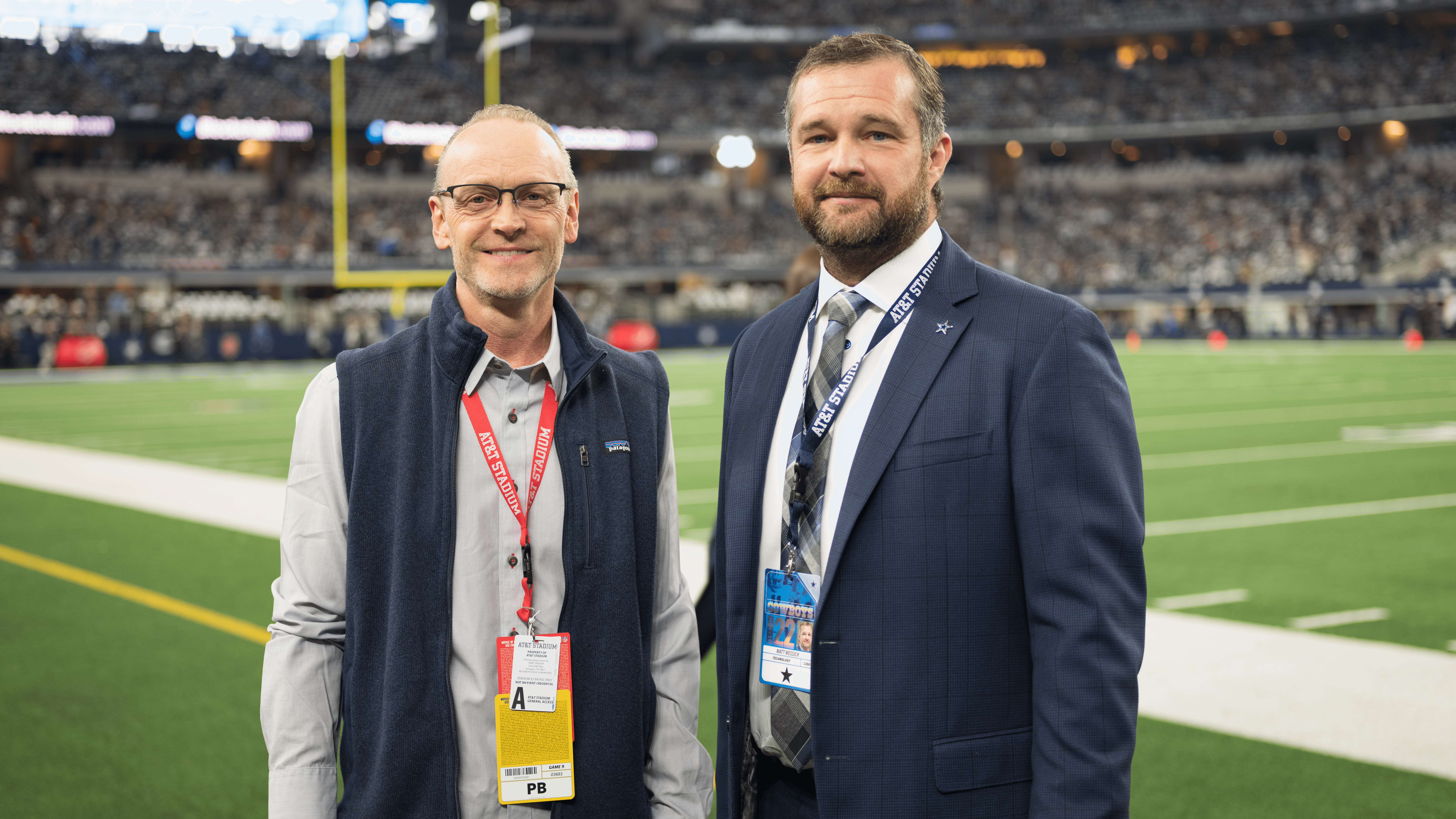 AT&T's Account Director, Derek Waterhouse (left) and Dallas Cowboys CIO Matt Messick (right) stand near the field just before game time.
(Source: Phil Harvey/Light Reading)