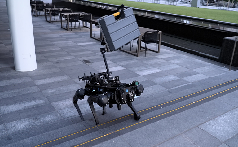 AT&T's robotic dog never leaves home without its briefcase. (Image source: AT&T)