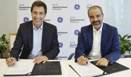 Johannes Koch (left), managing director, Middle East and Africa for HPE and Ali Saleh, senior vice president and chief commercial officer for GE Digital MEA try out their best smiles as they commit to a three-year partnership. 