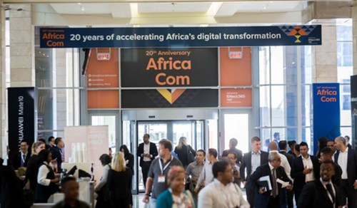 The doors open and delegates flood in on the first day of the 20th anniversary AfricaCom, November 7, 2017.