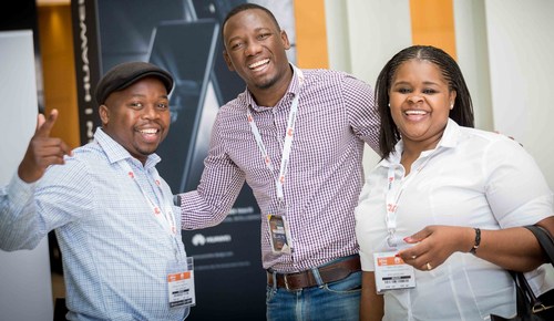 Very happy attendees arriving on the first day of AfricaCom 2017 in Cape Town in early November.