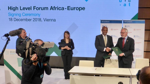 EIB President W. Hoyer and Bandwidth and Cloud Services CEO Y. Maru announcing EUR 15 million new EIB support for to improve communications in East Africa at Africa-Europe High-Level Forum in Vienna.