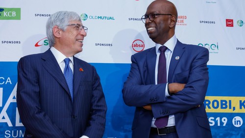 Safaricom CEO Bob Collymore (right) chats with Mark Kramer, Co-Founder & MD, FSG Social Impact Advisors and Senior Fellow, Havard Business School (US) during the 2019 Africa Shared Value summit held at the Radisson Hotel Nairobi on May 23.