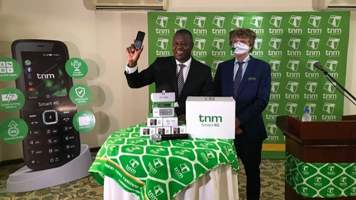 Malawi's Minister of Information Gospel Kazako unveiling the TNM Smart 4G phone with TNM CEO Michiel Buitelaar. 
