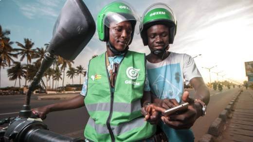 A Gozem moto-taxi driver and customer. (Source: Gozem website). 