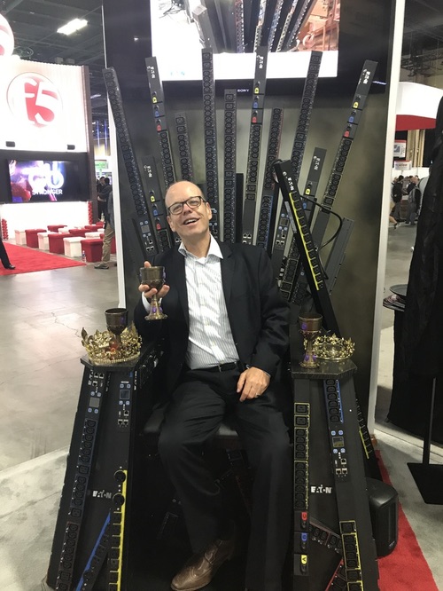 Here I am visiting the Eaton Power Management booth, with a Game of Thrones theme. The throne is made of power supply components. 