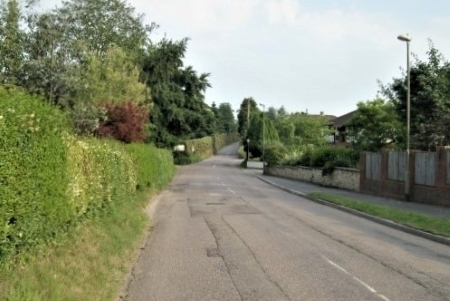 After Openreach deploys fiber-to-the-home, Ottery St. Mary residents will be able to zip along the high-speed broadband network but will still have to drive slowly down the area's country lanes for safety reasons, and to avoid the many sheep that tend to block the roads.  
(Photo source: Copyright Kevin Hale and licensed for reuse under Creative Commons Licence)