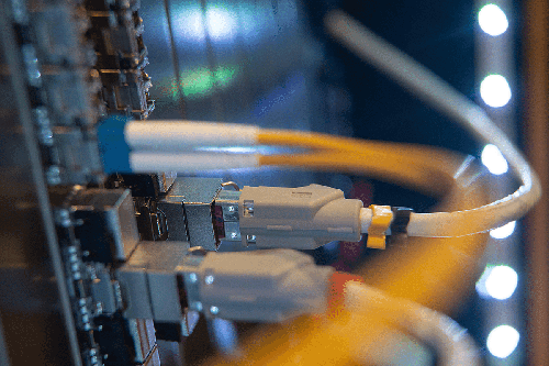 File photo of Ethernet cables plugged into a DOCSIS 3.1 module.  
(Source: Sebastian Gollnow/dpa/Alamy Live News)